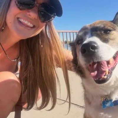 Kim and her dog at the lake